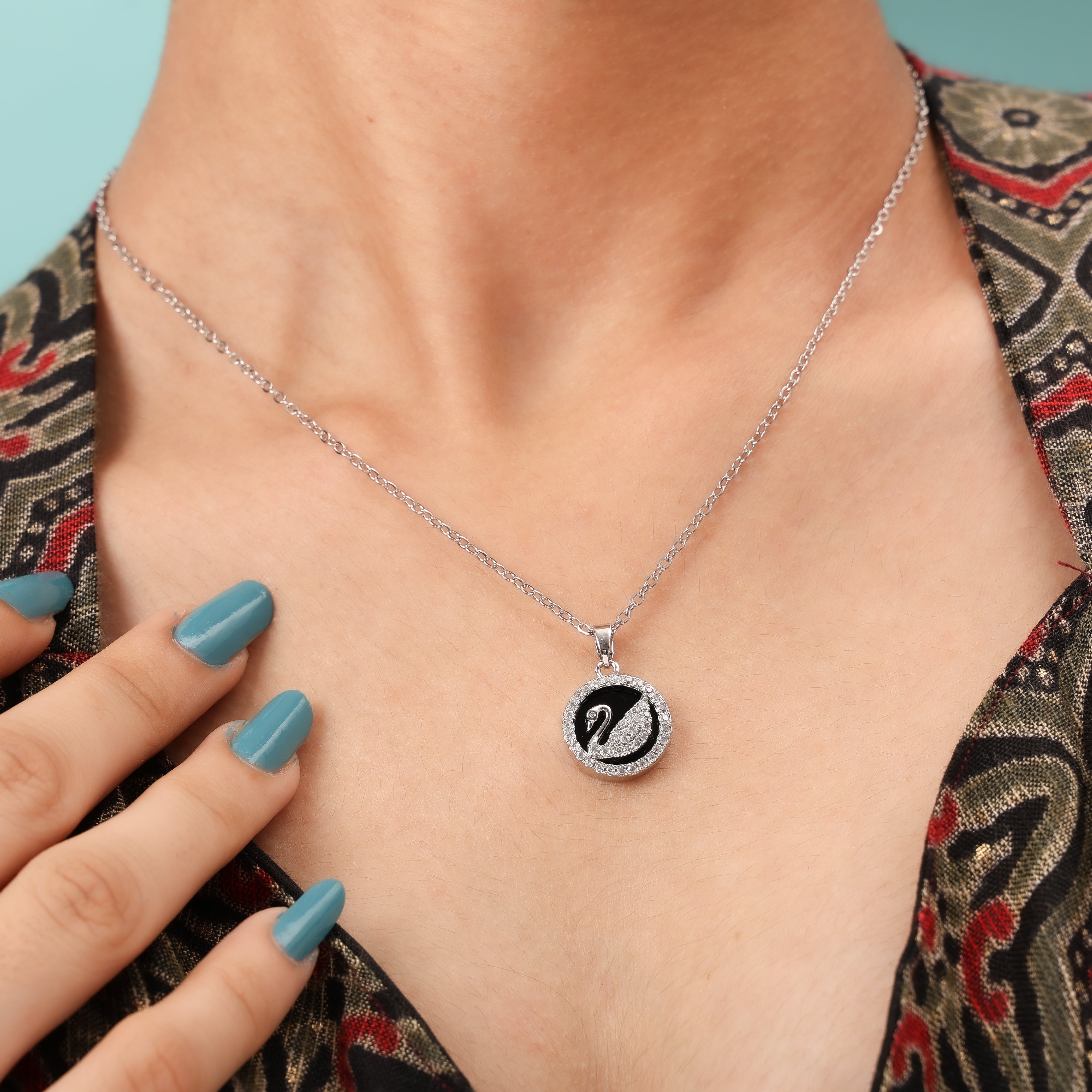 Rhodium Plated Swan Medallion Necklace