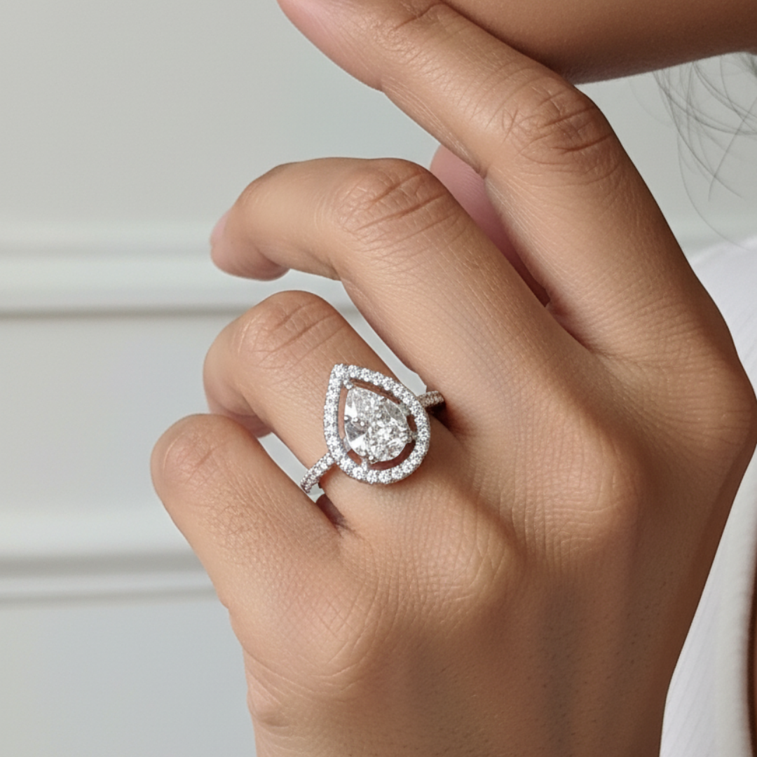 Pear Halo Bypass Zircon Ring