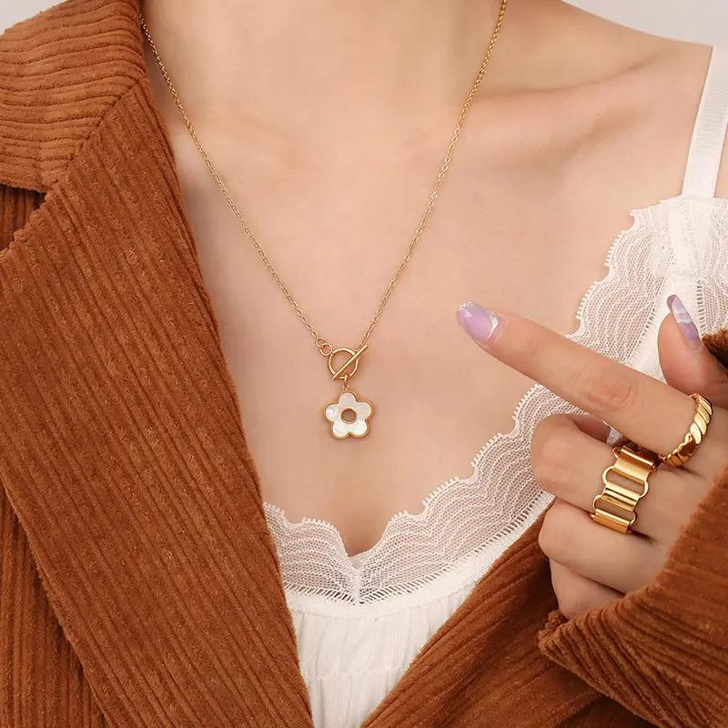 18k Gold Ivory Blossom Pendant