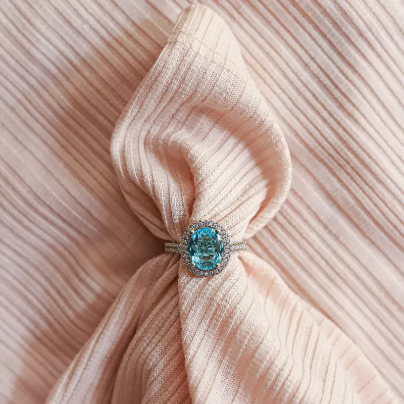 Oval Blue Zircon Halo Ring