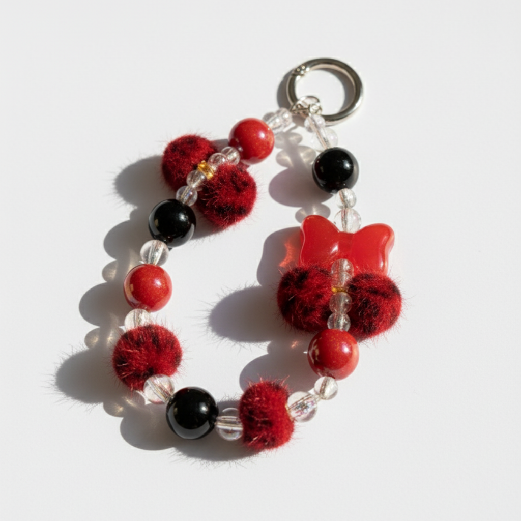 Crimson Bow Bead Phone Charm