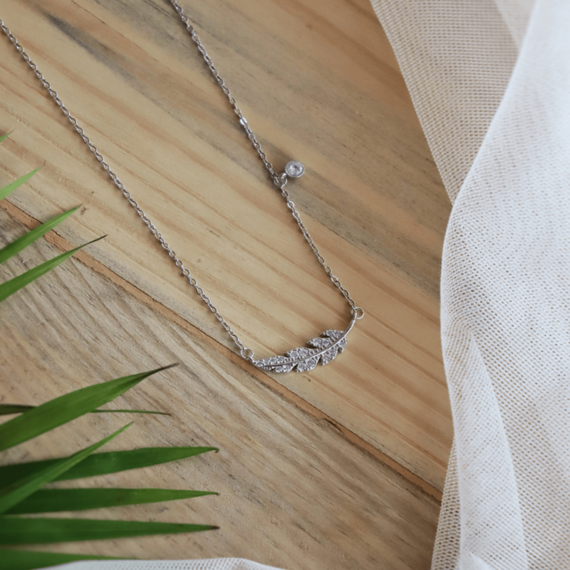 Feather cross necklace