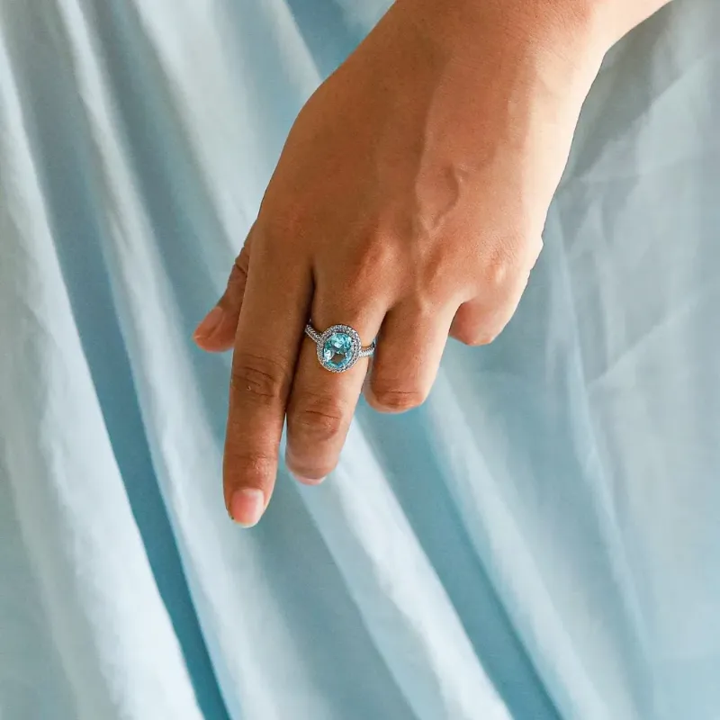 Oval Blue Zircon Halo Ring