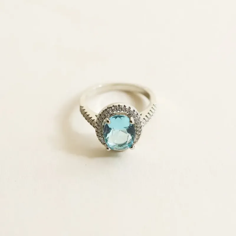 Oval Blue Zircon Halo Ring