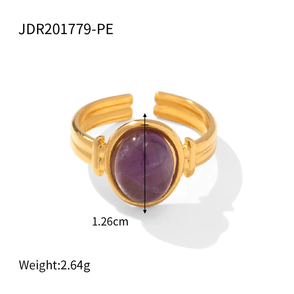 Caged golden purple ring